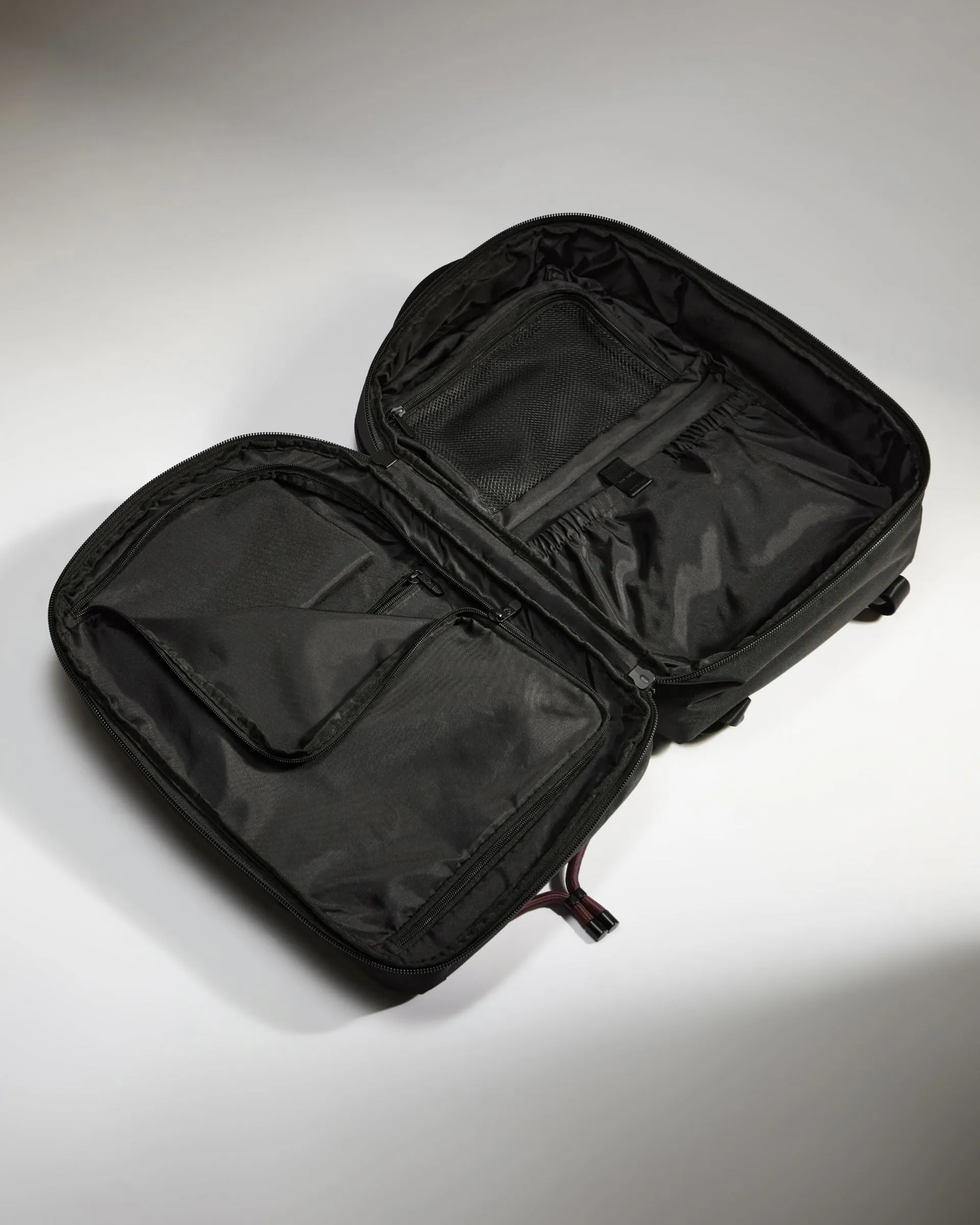 Optimize the e-commerce product title by adding descriptive modifiers that highlight its features and appeal to potential buyers: Lightweight and Durable Discovery Backpack in Stylish Heather Purple for Everyday Use.