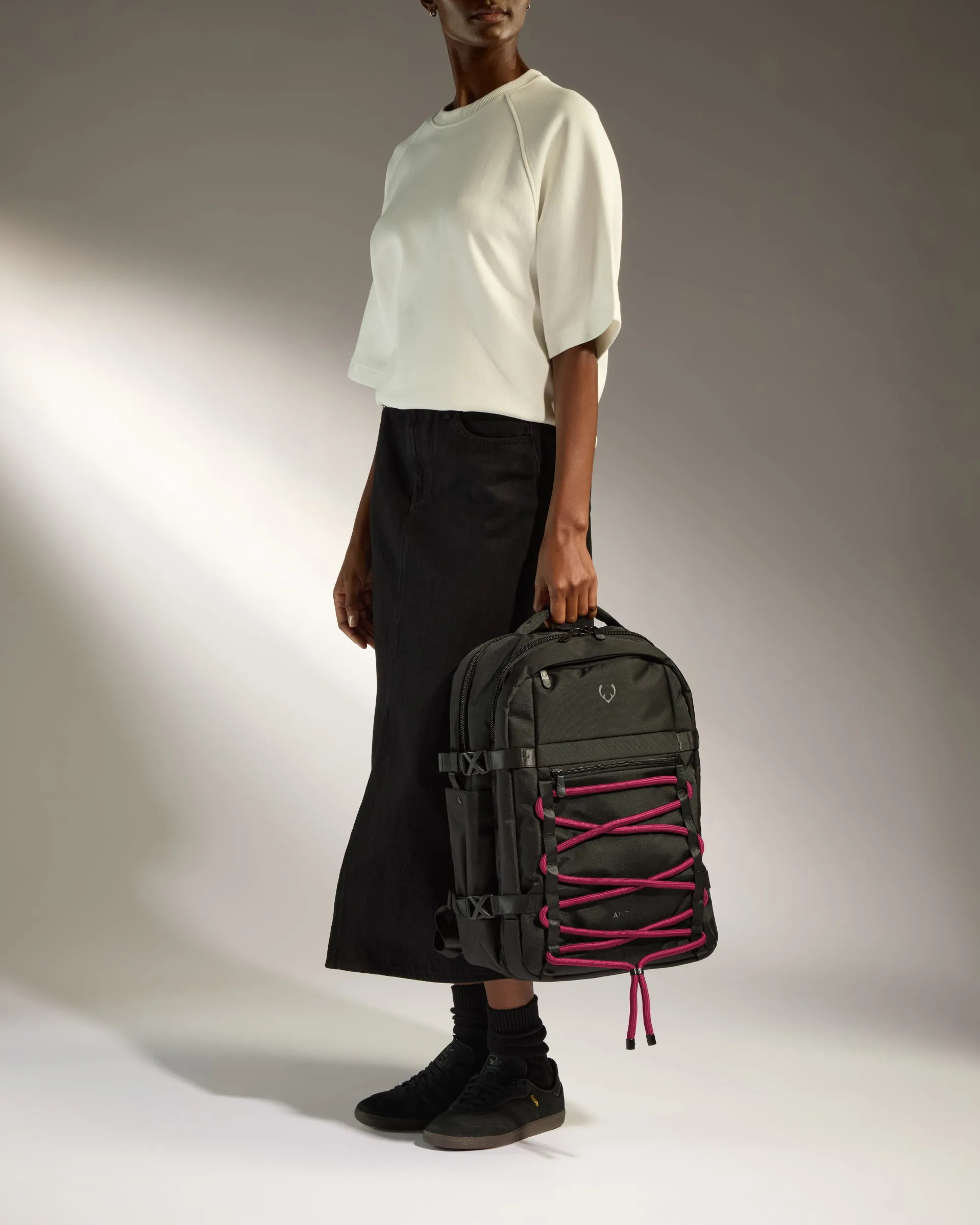 Optimize the e-commerce product title by adding descriptive modifiers that highlight its features and appeal to potential buyers: Lightweight and Durable Discovery Backpack in Stylish Heather Purple for Everyday Use.